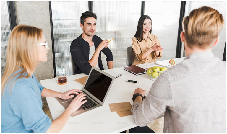 Employer welcoming new hire – Permanent staffing services by Arck Recruitment